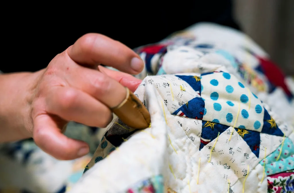 Someone doing quilting